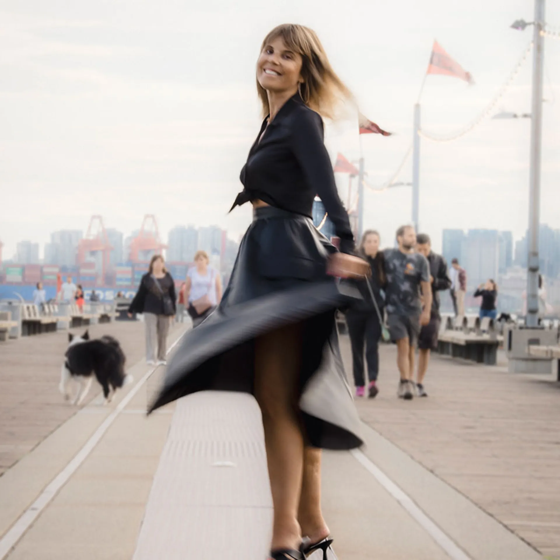Dr. Erica Harris walking by the waterfront
